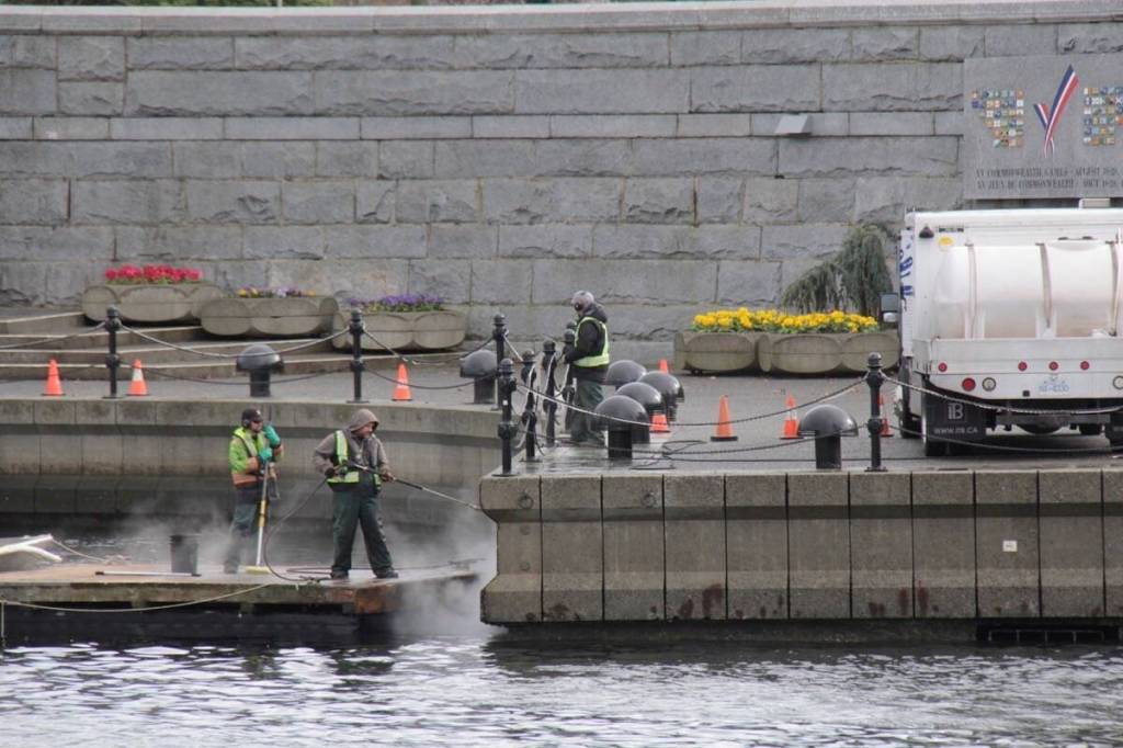 Crews powerwash along the Inner Harbour as Victoria prepares for spring. (Christine van Reeuwyk/Victoria News)
