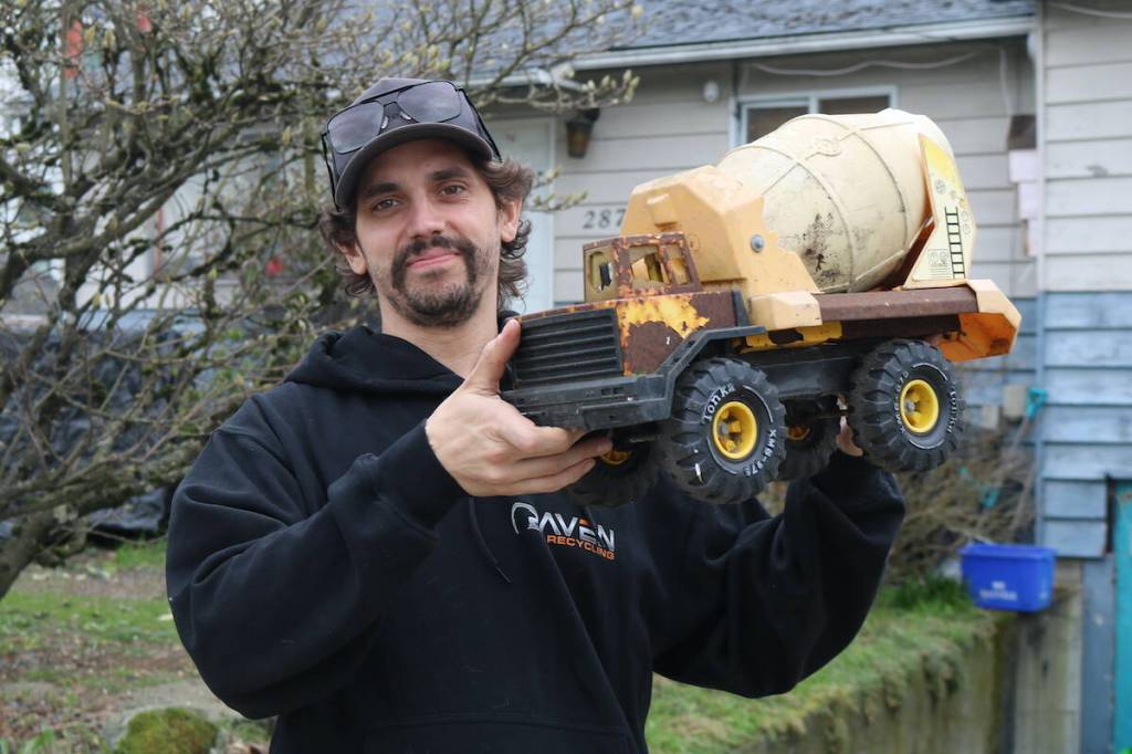 After 13 years at his Peatt Road home, and around six years displaying Tonka trucks in his front yard, Erik Berbenuik is moving on. (Ben Fenlon/Goldstream Gazette)