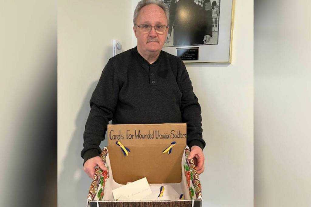 Langford Legion president Norm Scott with a collection box for &lsquo;get well soon&rsquo; cards for injured Ukrainian soldiers. (Courtesy of Vancouver Island Supports Ukraine)